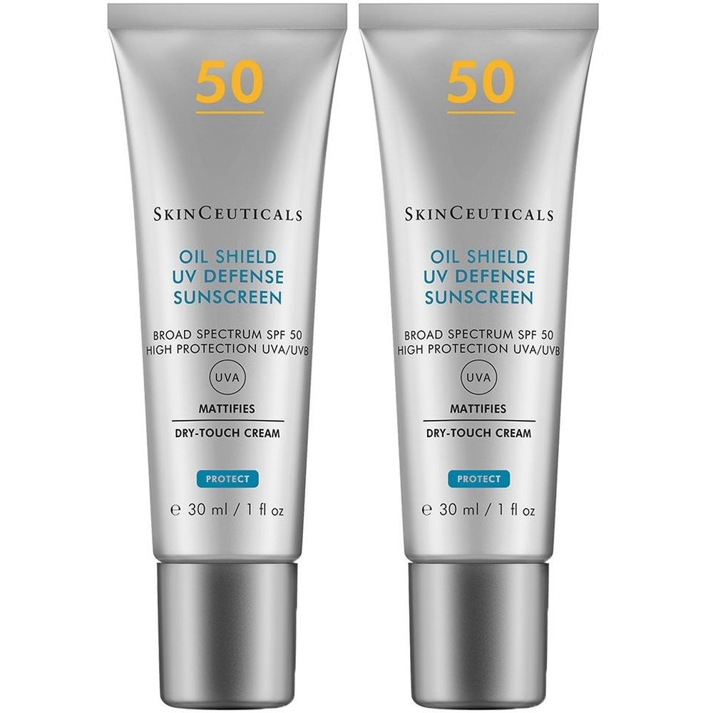 Deux tubes de crème solaire. Inscription: Oil Shield UV Defense Sunscreen SPF 50. Crème sèche matifiante. 30 ml.