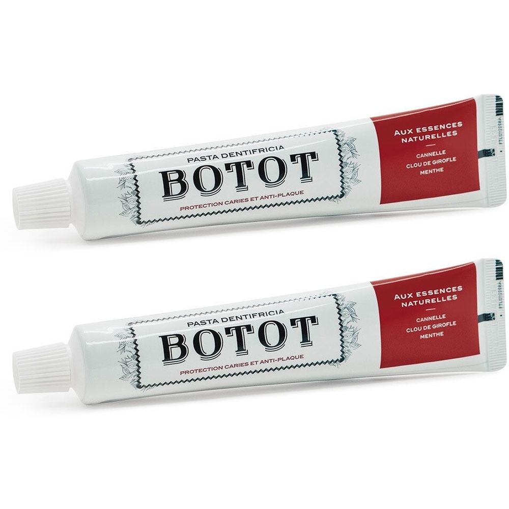 Deux tubes de dentifrice blancs. Inscriptions: BOTOT, AUX ESSENCES NATURELLES, Cannelle, Clou de Girofle, Menthe. Protection caries et anti-plaque.