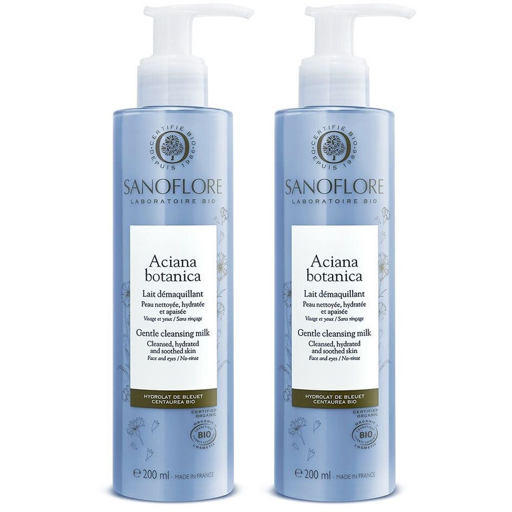 Twee blauwe flessen met witte pomp. Opschrift: SANOFLORE, Aciana botanica, Lait démaquillant. Bio-certificering.
