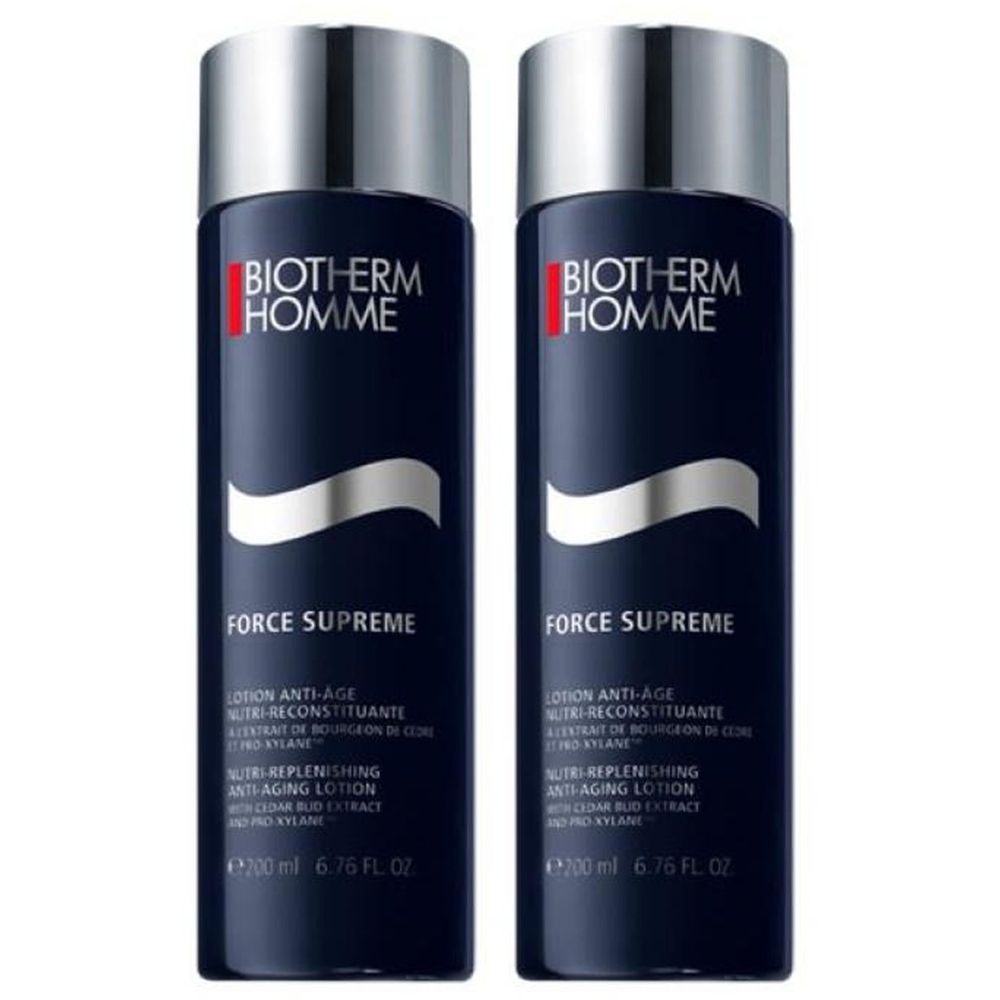 Twee flessen Biotherm Homme Force Supreme lotion. Donkerblauwe flessen met zilveren doppen en witte tekst.