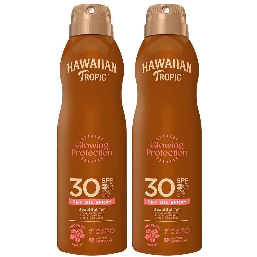 Twee bruine spuitbussen. Opschrift: HAWAIIAN TROPIC, Glowing Protection, SPF 30. Droge olie spray.