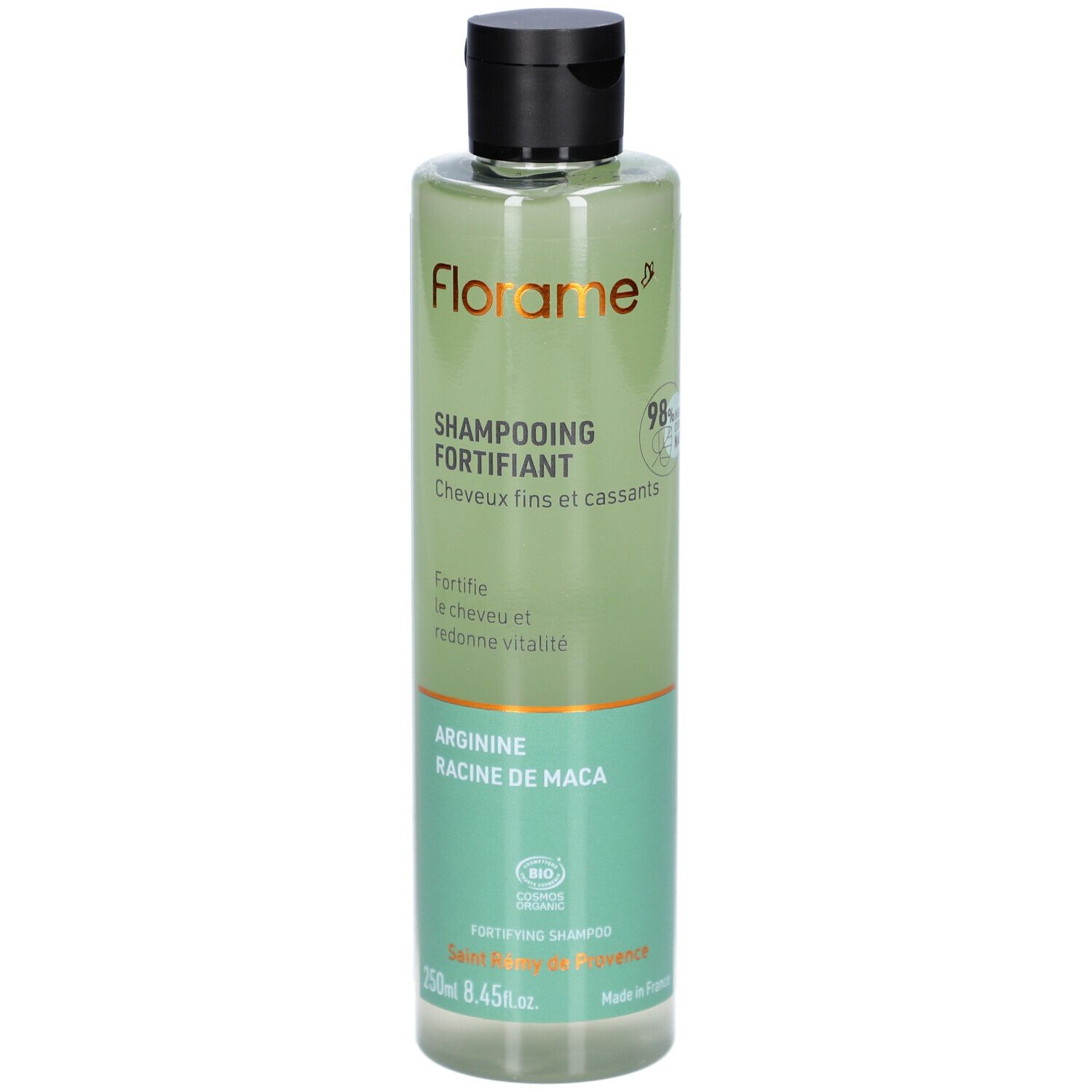 Groene shampoo fles met zwarte dop. Opschrift: FLORAME, Shampooing Fortifiant, Arginine, Racine de Maca. Bio-certificering.
