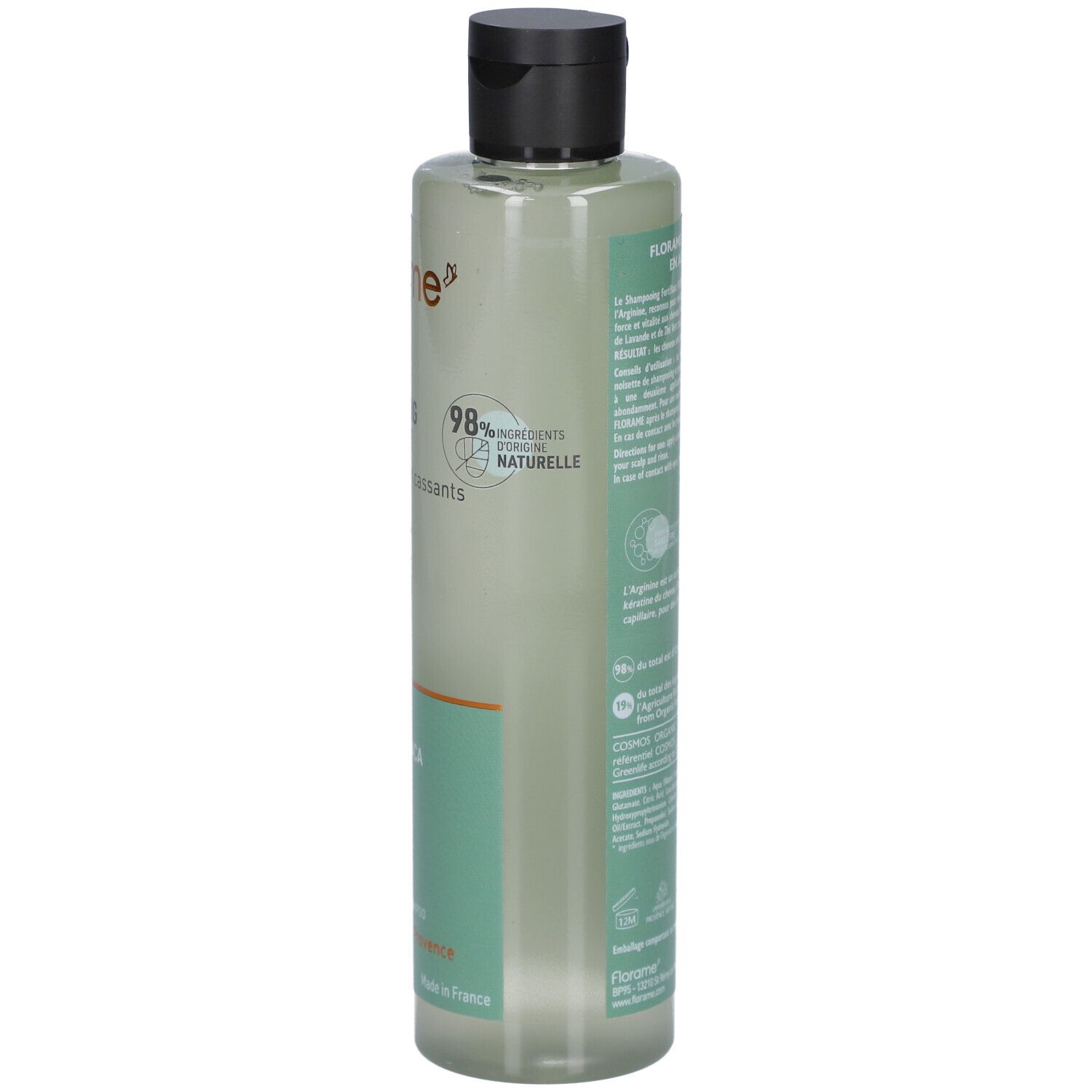 Achterkant van een groene shampoo fles met zwarte dop. Tekst: FLORAME, 98% natuurlijke ingrediënten. Bio-certificering.