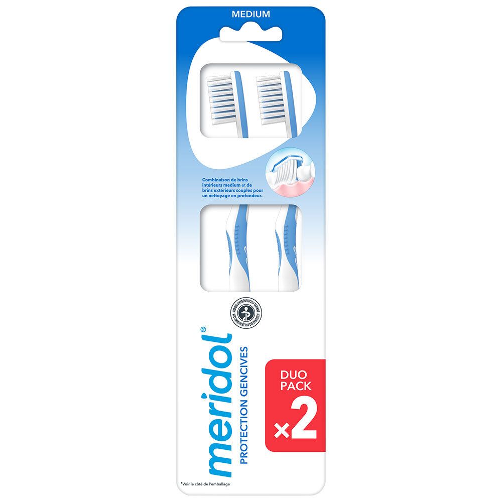 Pack de deux brosses à dents. Soies bleues et blanches, manches bleus. Logo "MERIDOL". "MEDIUM" et "DUO PACK x2" sur l'emballage.
