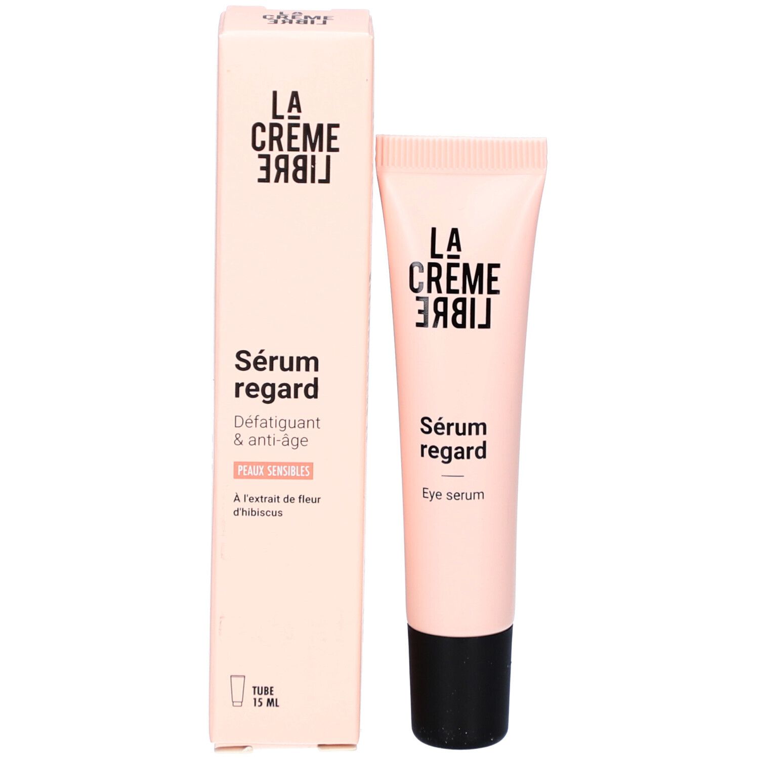 Roze doos en tube. Opschrift: LA CRÈME LIBRE, Sérum regard, Défatigant & anti-âge, Eye serum.