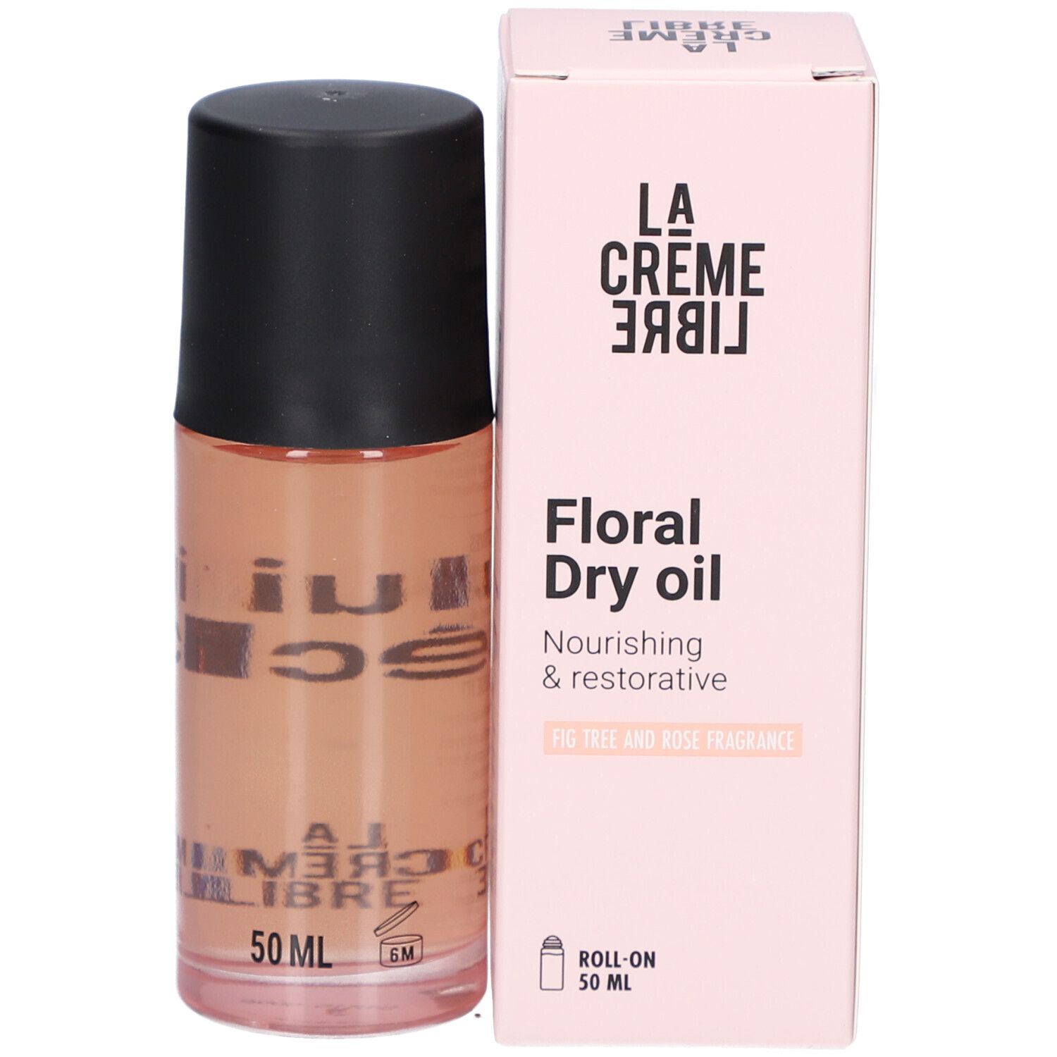 Flacon et boîte roses. Inscription : La Crème Libre, Floral Dry oil, Nourishing & restorative, Fig tree and rose fragrance, 50 ml.