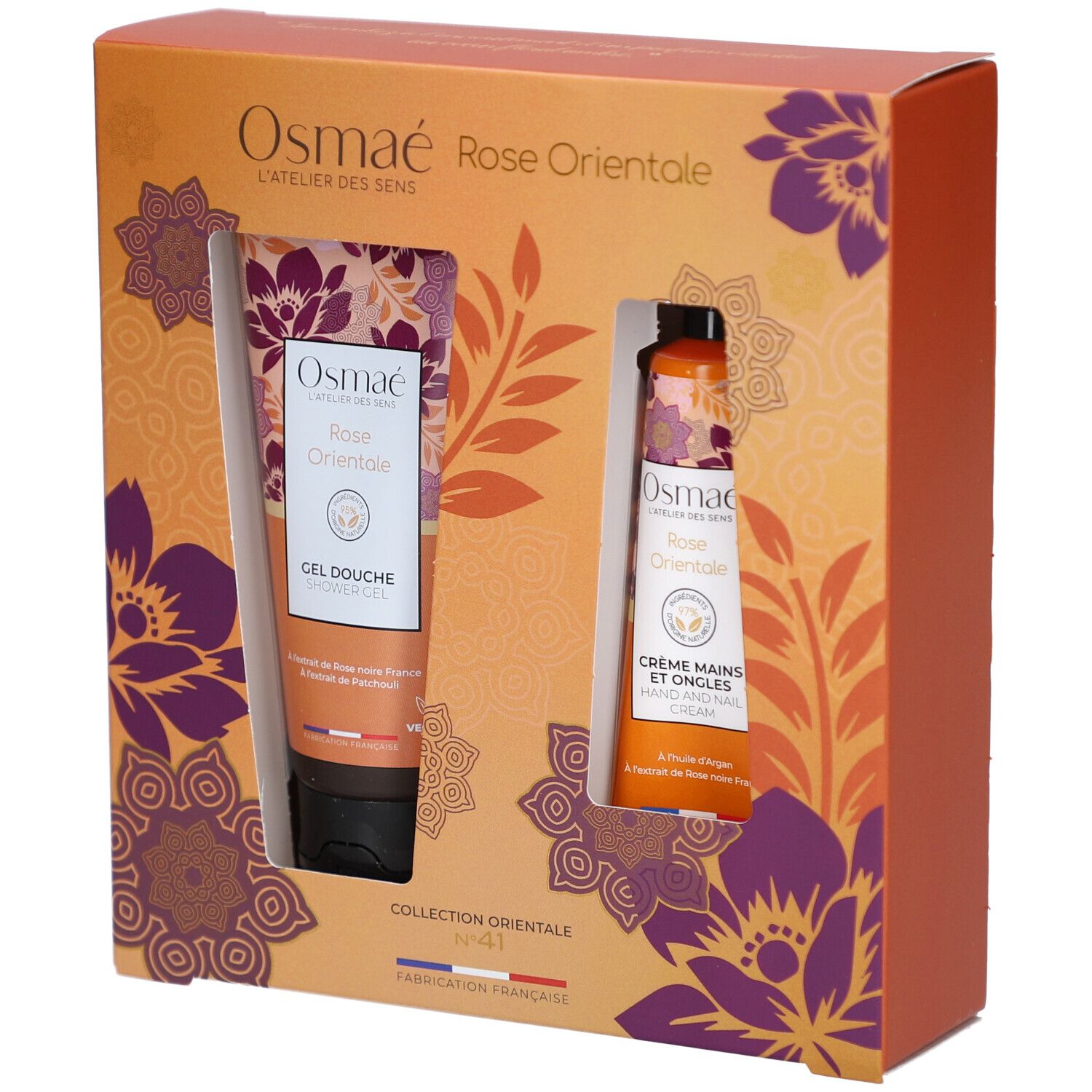 Coffret cadeau orange avec deux tubes. Gel douche et crème mains visibles. Décor floral et texte Rose Orientale.