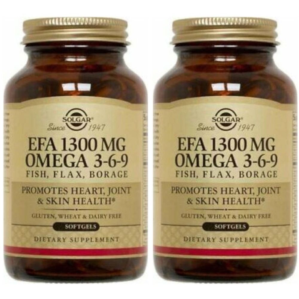Twee bruine glazen flessen met gouden doppen. Labels tonen SOLGAR EFA 1300 MG OMEGA 3-6-9. Glutenvrij, tarwevrij en zuivelvrij.