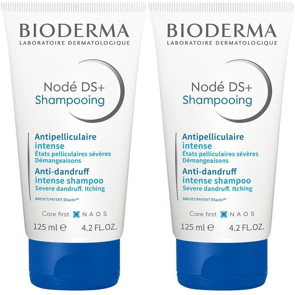 Deux tubes de shampooing Bioderma Nodé DS+. Tubes blancs avec bouchons bleus. Texte : Shampooing antipelliculaire, 125 ml.