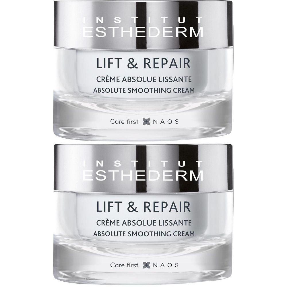 Twee potjes Institut Esthederm Lift & Repair crème. Glazen potjes met zilveren deksel. Tekst: Lift & Repair, Crème Absolue Lissante.