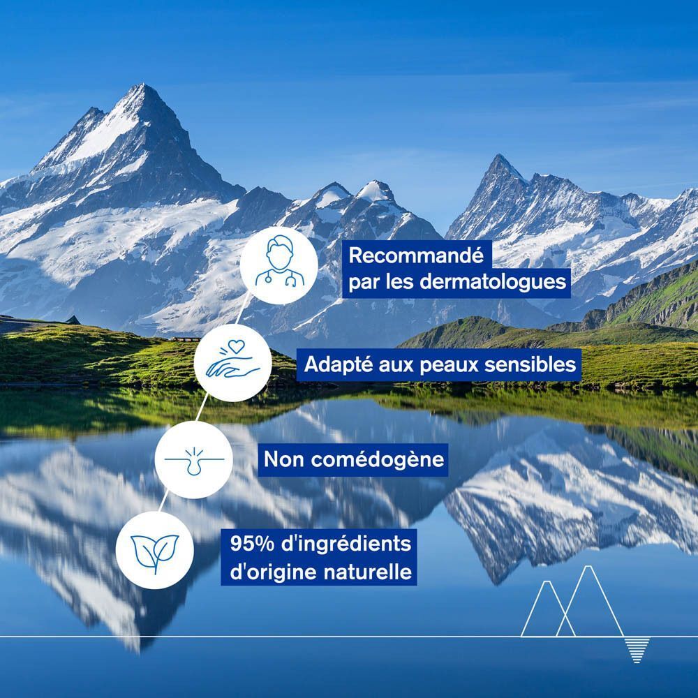Paysage avec montagnes et lac. Texte: Recommandé par les dermatologues, Adapté aux peaux sensibles, Non comédogène, 95% d'ingrédients d'origine naturelle.