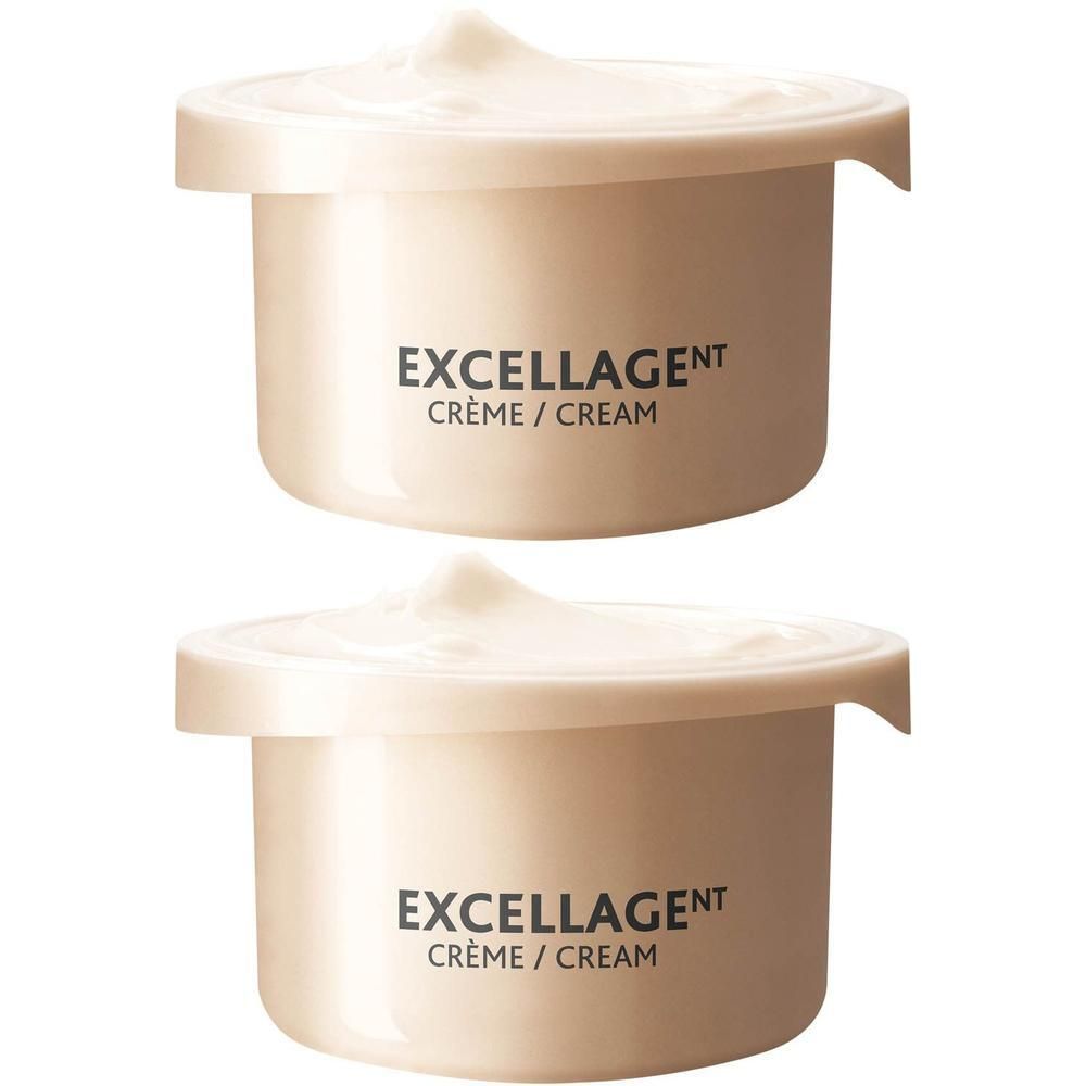 Deux pots de crème avec couvercles. EXCELLAGENT CRÈME/CREAM est écrit sur les pots. De la crème est visible.