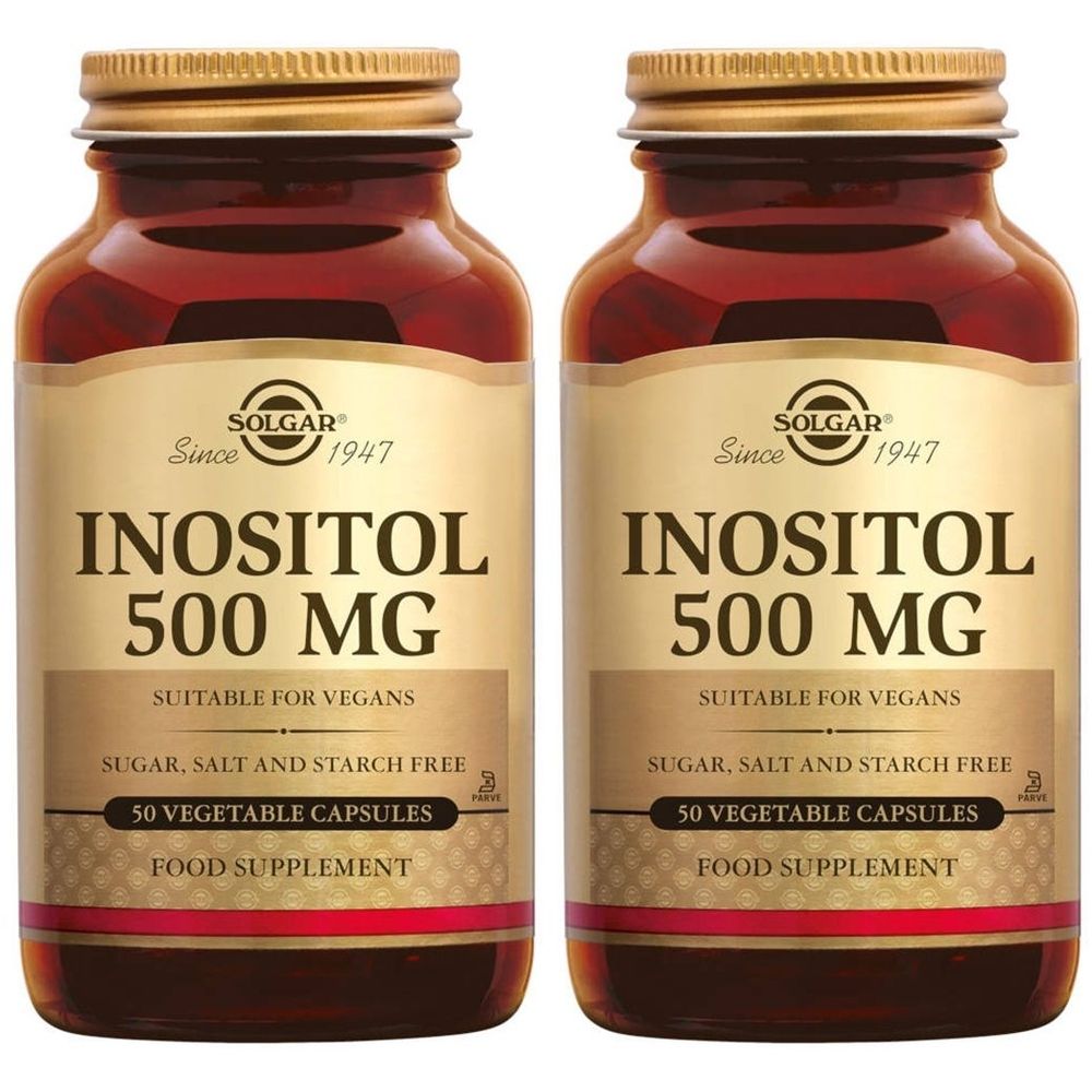 Twee flessen Solgar Inositol 500 mg. Bruine glazen flessen met gouden doppen en etiketten. Opschrift: Inositol 500 mg, geschikt voor veganisten.
