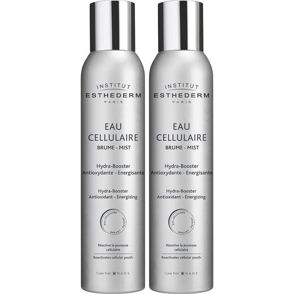 Deux flacons brume argentés. Inscription: Institut Esthederm Eau Cellulaire Brume-Mist. Hydra-Booster, Antioxydant, Énergisant.
