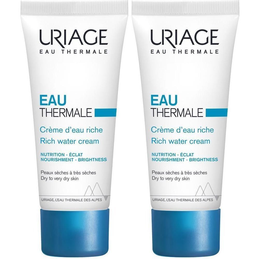 Deux tubes de crème. Blanc, avec texte et accents bleus. Inscription: Uriage Eau Thermale.