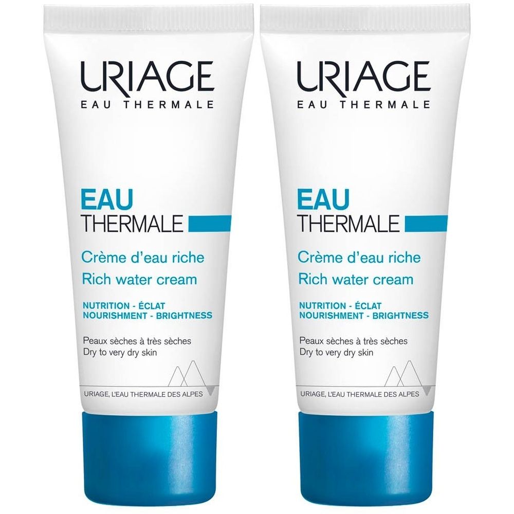 Twee crèmetubes. Wit, met blauwe tekst en accenten. Opschrift: Uriage Eau Thermale.