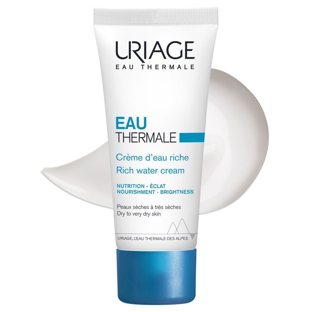 Un tube de crème avec une goutte de crème à côté. Inscription: Uriage Eau Thermale. Texte en français.