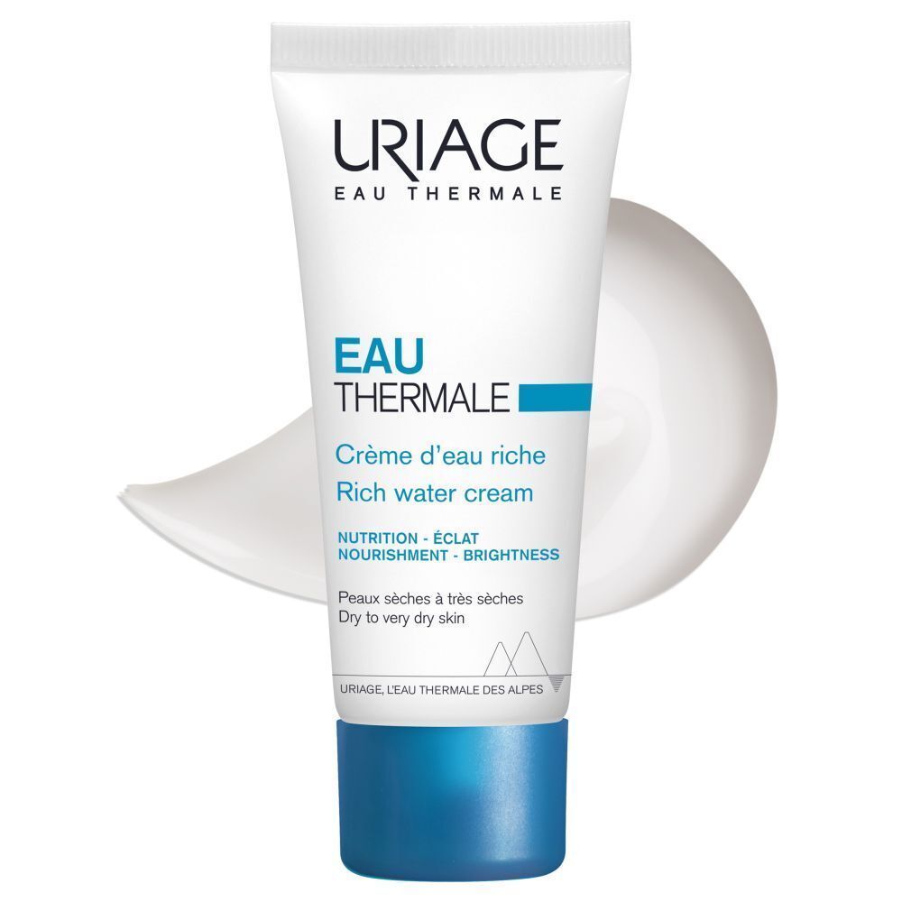 Close-up van een gezicht met crème. Tekst: Zachte En Omhullende Crème. Frisse & Delicate Geur. Perfecte Make-Up Basis.