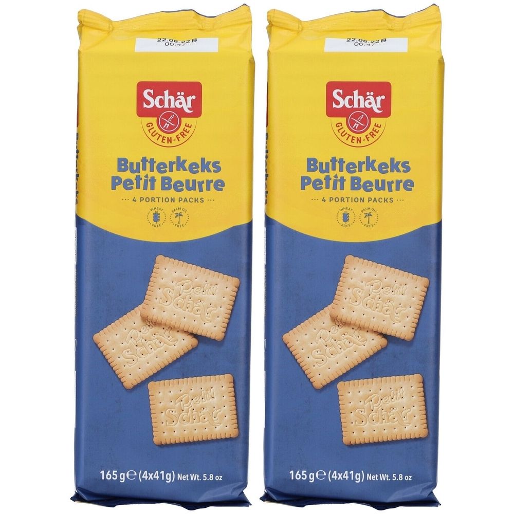 Twee pakken Schär boterkoekjes. Gele en blauwe verpakking. Opschrift: Butterkeks Petit Beurre, glutenvrij.