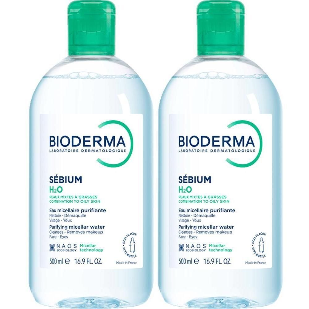 Twee flessen met groene dop. Opschrift: BIODERMA, Sébium H2O, Eau micellaire purifiante. 500 ml.