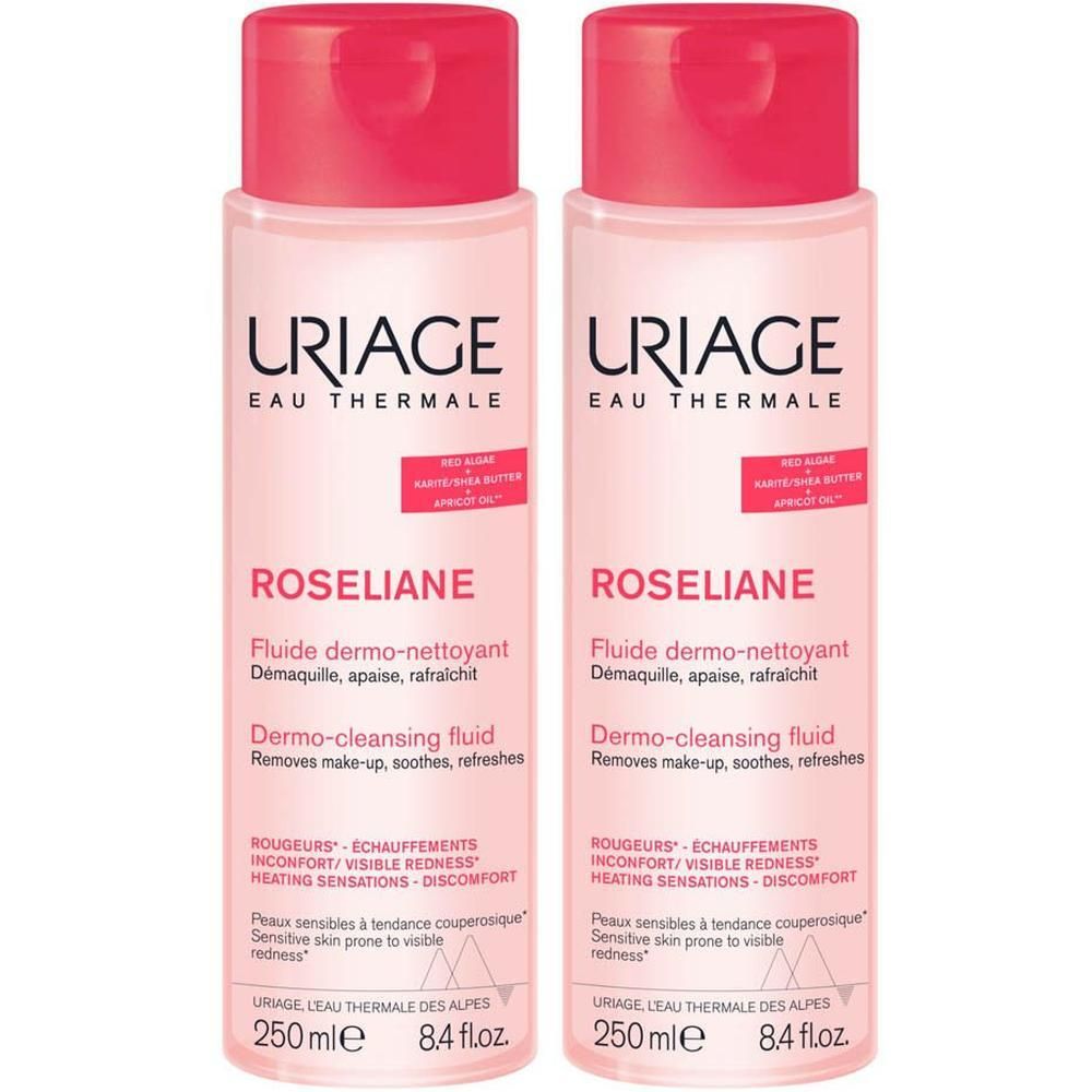 Deux flacons de Uriage Roséliane. Liquide rose, bouchon rouge. Texte sur l'étiquette.