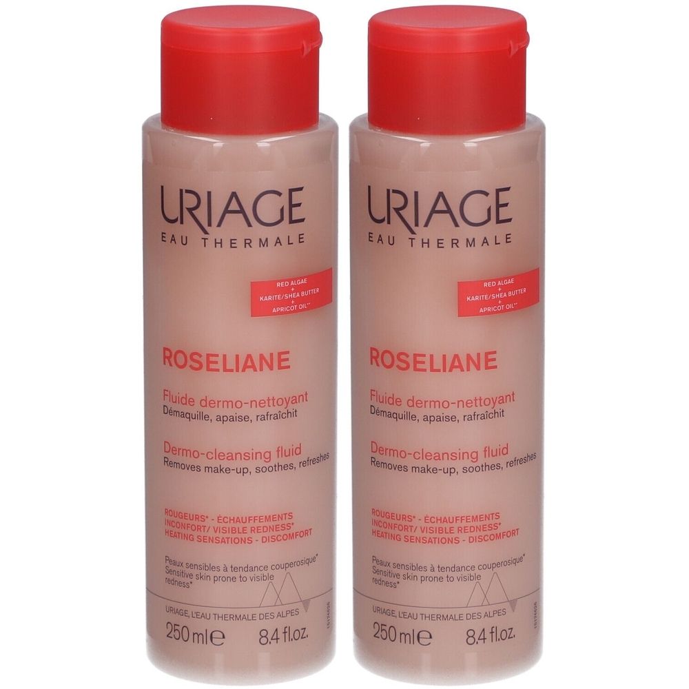 Deux flacons de Uriage Roséliane. Liquide rose, bouchon rouge. Texte sur l'étiquette.