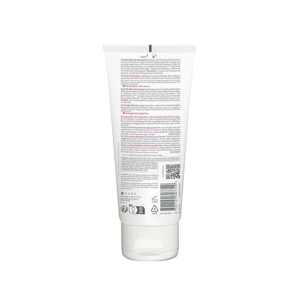 Achterkant van een witte tube. Meertalige tekst. Opschrift BIODERMA. QR-code en logo's.