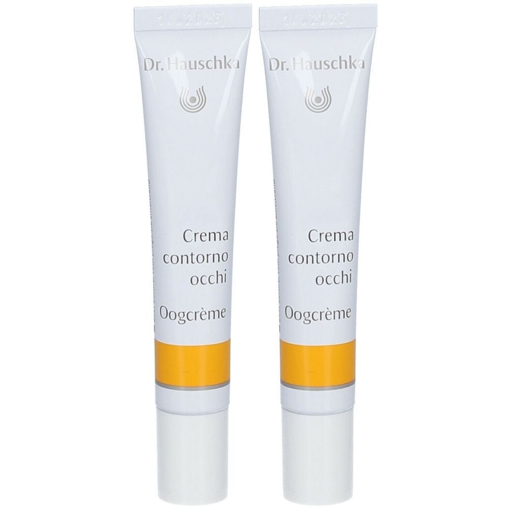 Twee tubes oogcrème. Wit, met gele streep en tekst. Merk: Dr. Hauschka. Tekst: Crema contorno occhi, Oogcrème.