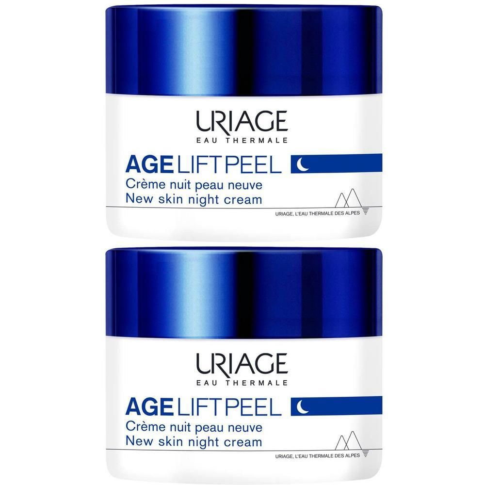 Deux pots de crème de nuit Uriage Age Lift Peel. Pots blancs avec couvercle bleu. Texte sur l'étiquette.