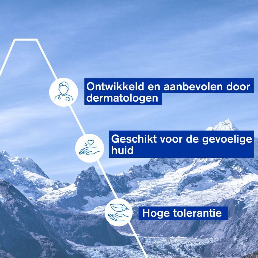 Grafiek met berglandschap. Tekst: Ontwikkeld en aanbevolen door dermatologen. Geschikt voor de gevoelige huid.