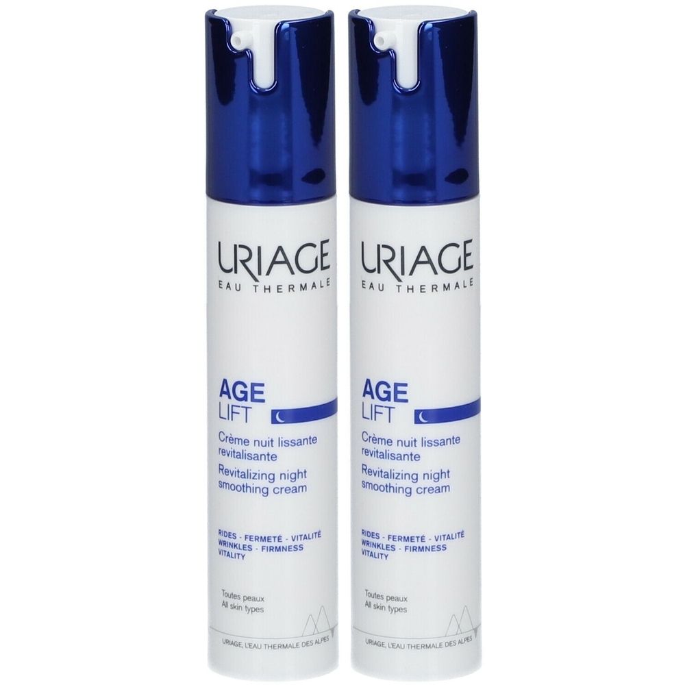 Twee flessen Uriage Age Lift nachtcrème. Witte flessen met blauwe dop. Tekst: Age Lift, Crème nuit lissante.