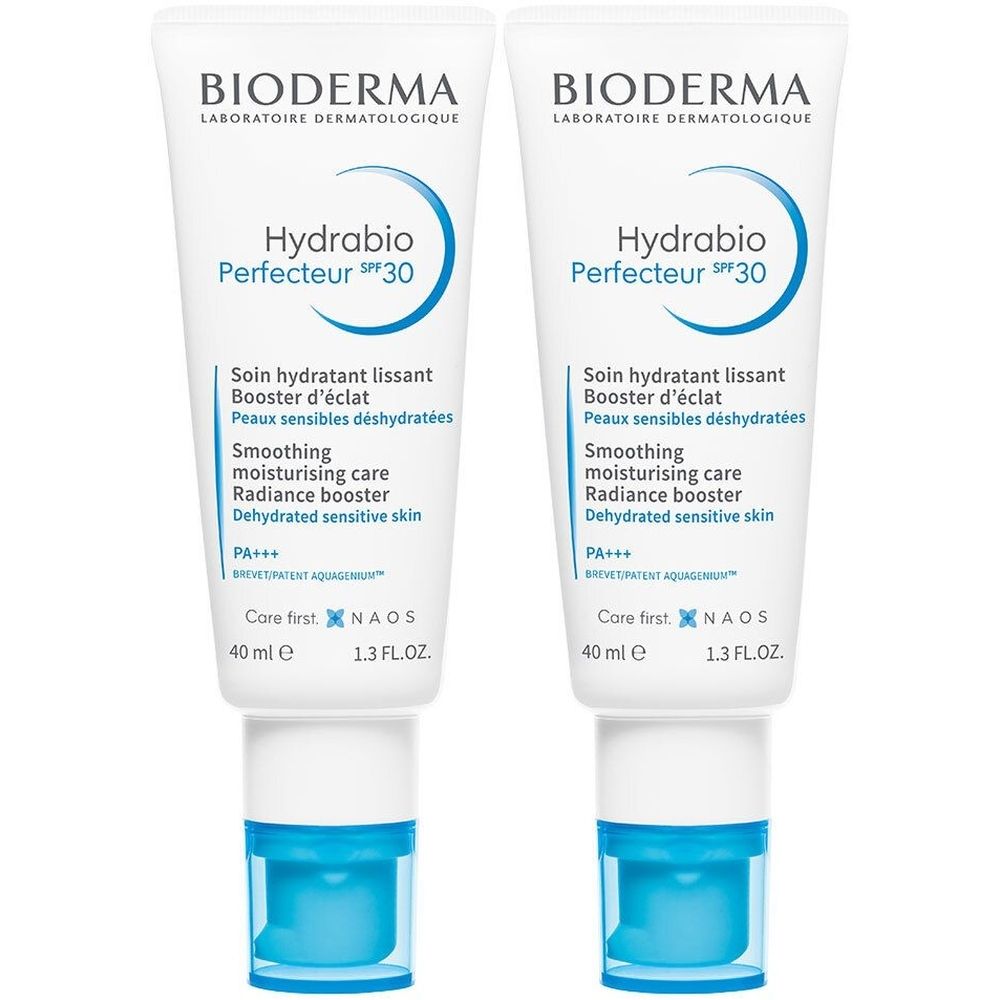 Deux tubes de Bioderma Hydrabio Perfecteur SPF30. Tubes blancs avec accents bleus. Inscription : Hydrabio Perfecteur SPF30, 40 ml.