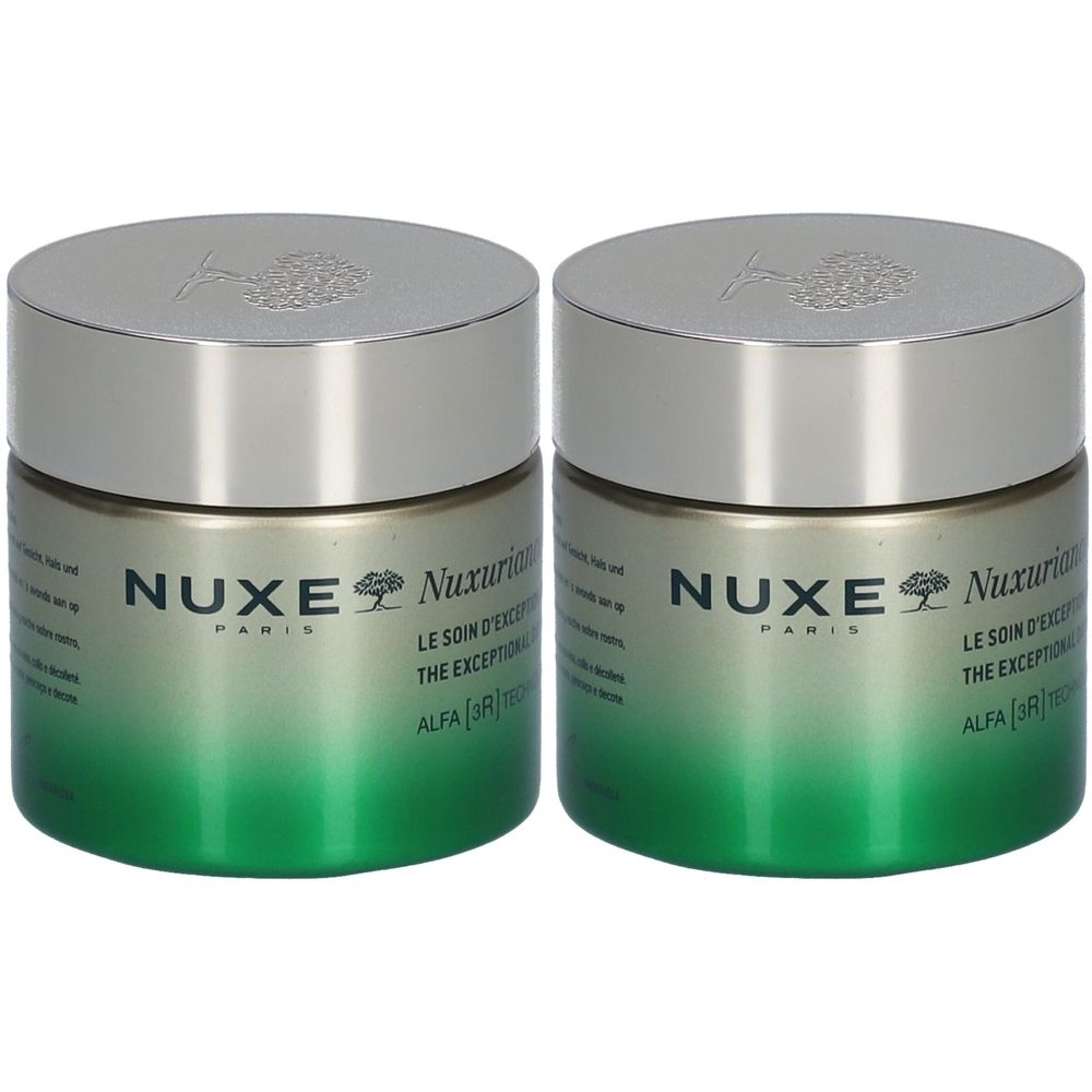 Twee potten Nuxe Nuxuriance. Zilveren deksels, groene potten. Opschrift Nuxe Paris, Nuxuriance Le soin d'exception jour & nuit.