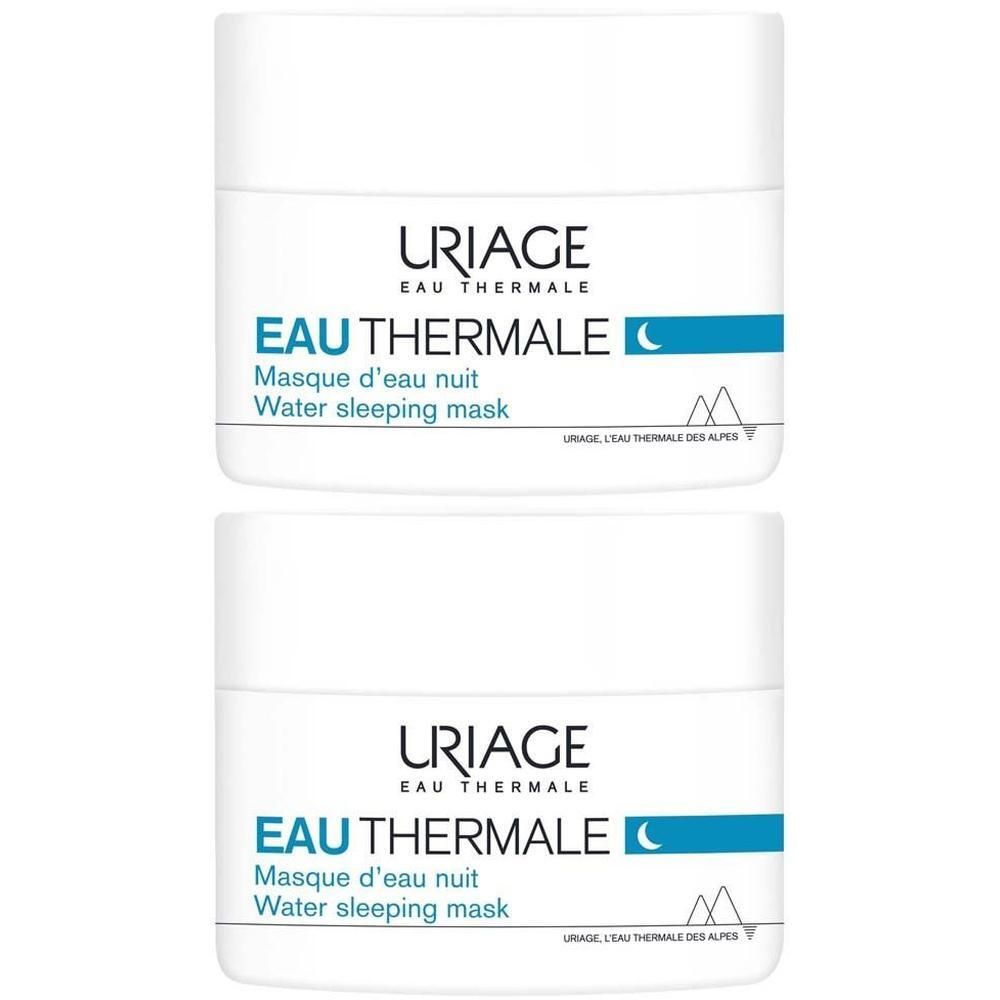 Twee witte potten met blauwe tekst. Opschrift: Uriage Eau Thermale, Masque d'eau nuit, Water sleeping mask.