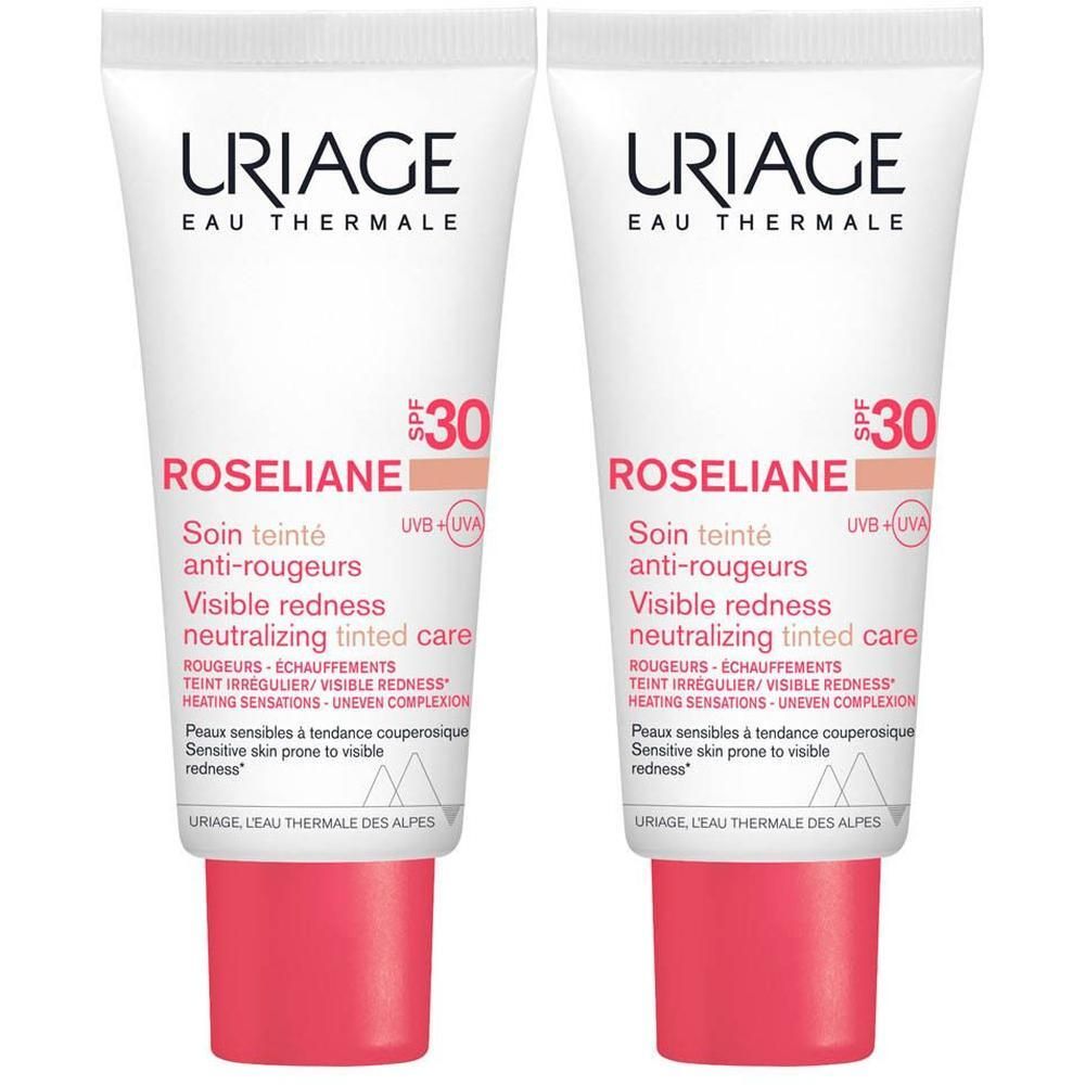 Deux tubes Uriage Roséliane soin teinté anti-rougeurs. Blanc, accents roses. Texte: SPF30.