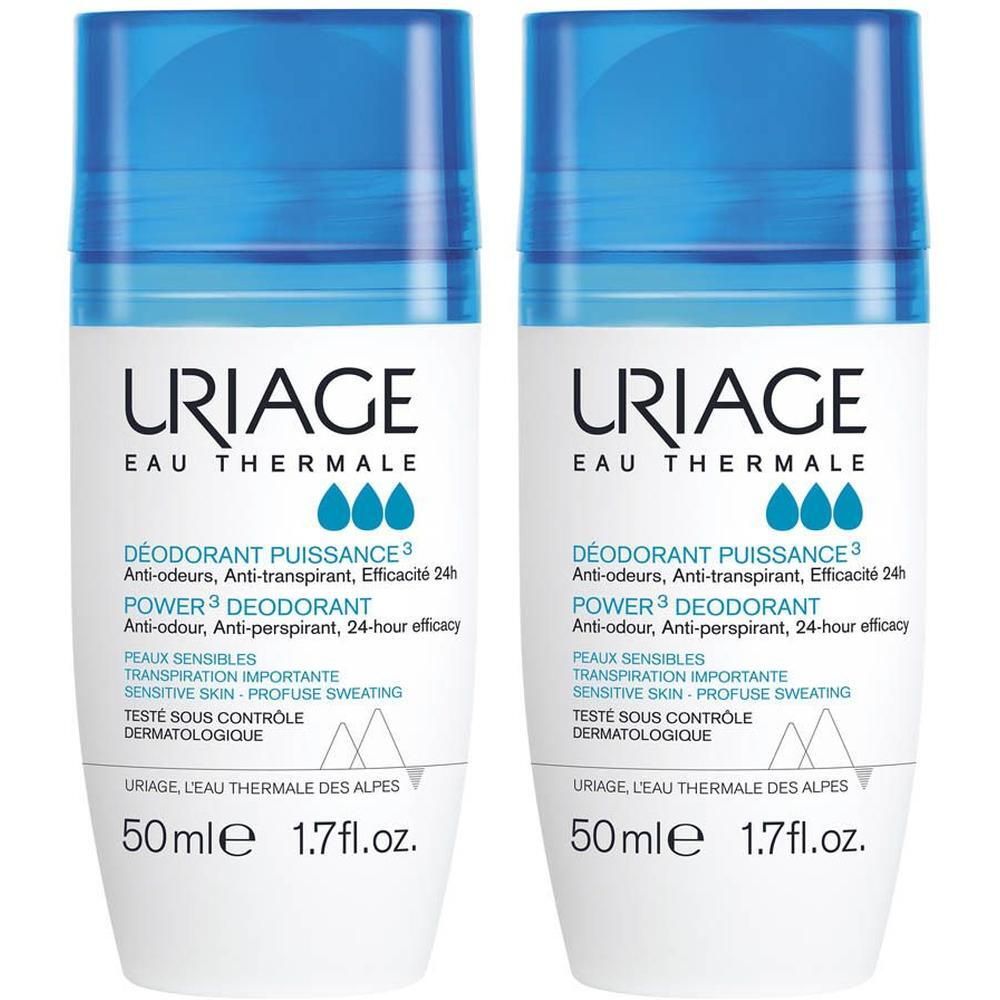 Twee witte roll-on deodorants met blauwe doppen. Opschrift: URIAGE Eau Thermale, Power3 Deodorant, 50ml.