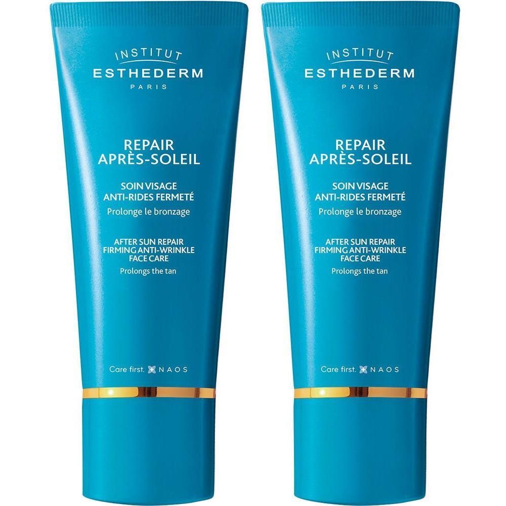Deux tubes bleus avec détails dorés. Inscription: Institut Esthederm, Repair Après-Soleil, soin visage anti-rides fermeté.