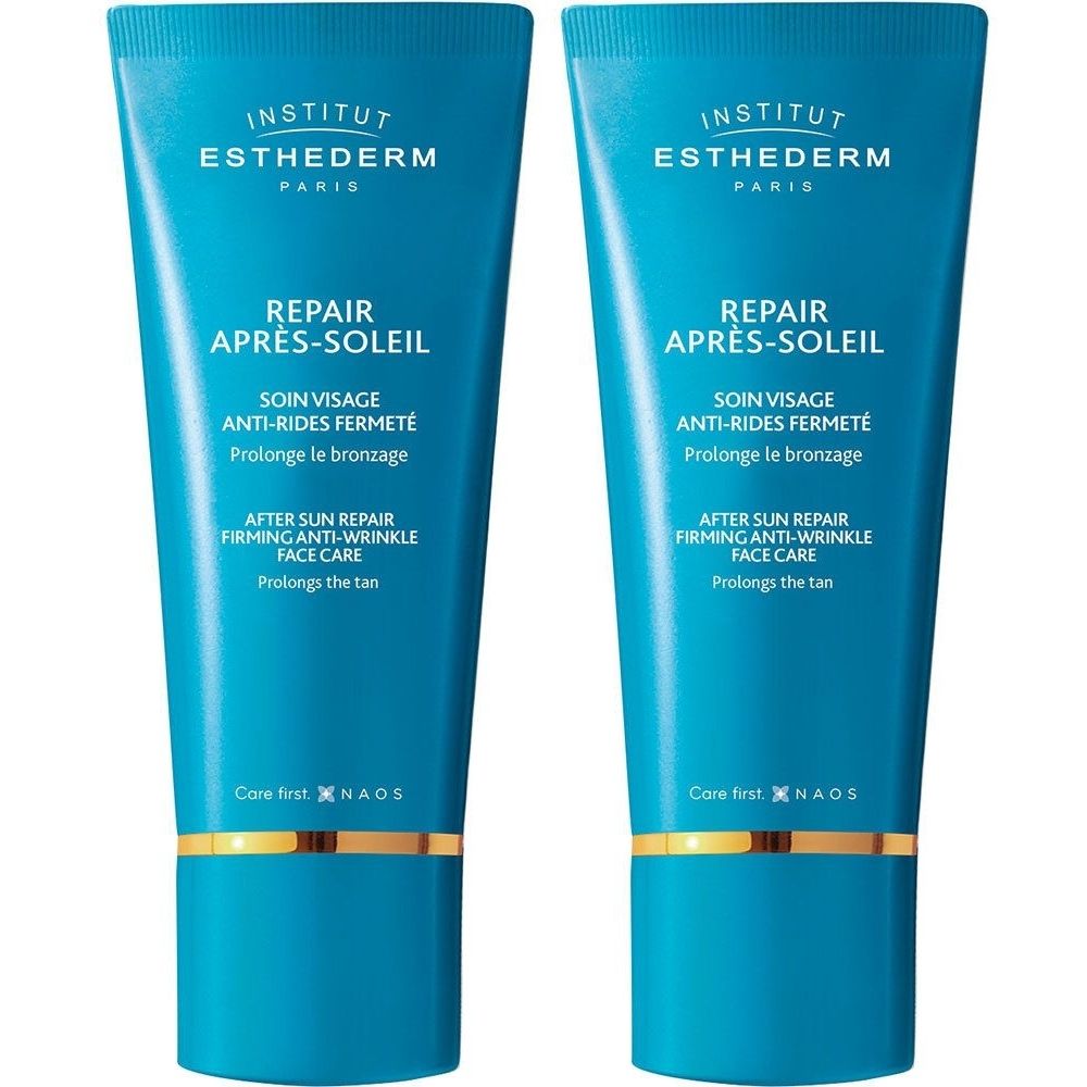 Twee blauwe tubes met gouden details. Opschrift: Institut Esthederm, Repair Après-Soleil, anti-rimpel gezichtsverzorging.
