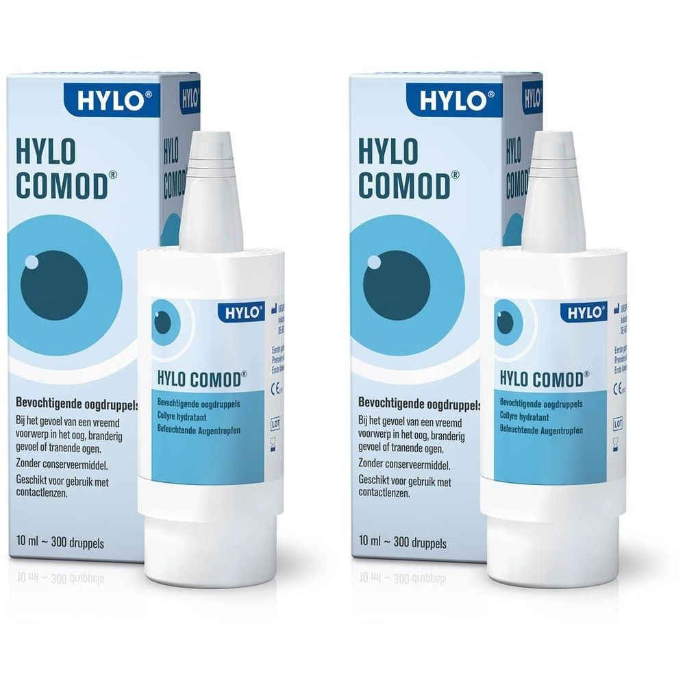 Twee flessen en verpakkingen. Opschrift HYLO-COMOD. Witte flessen met blauw logo. Verpakking met blauw oog.