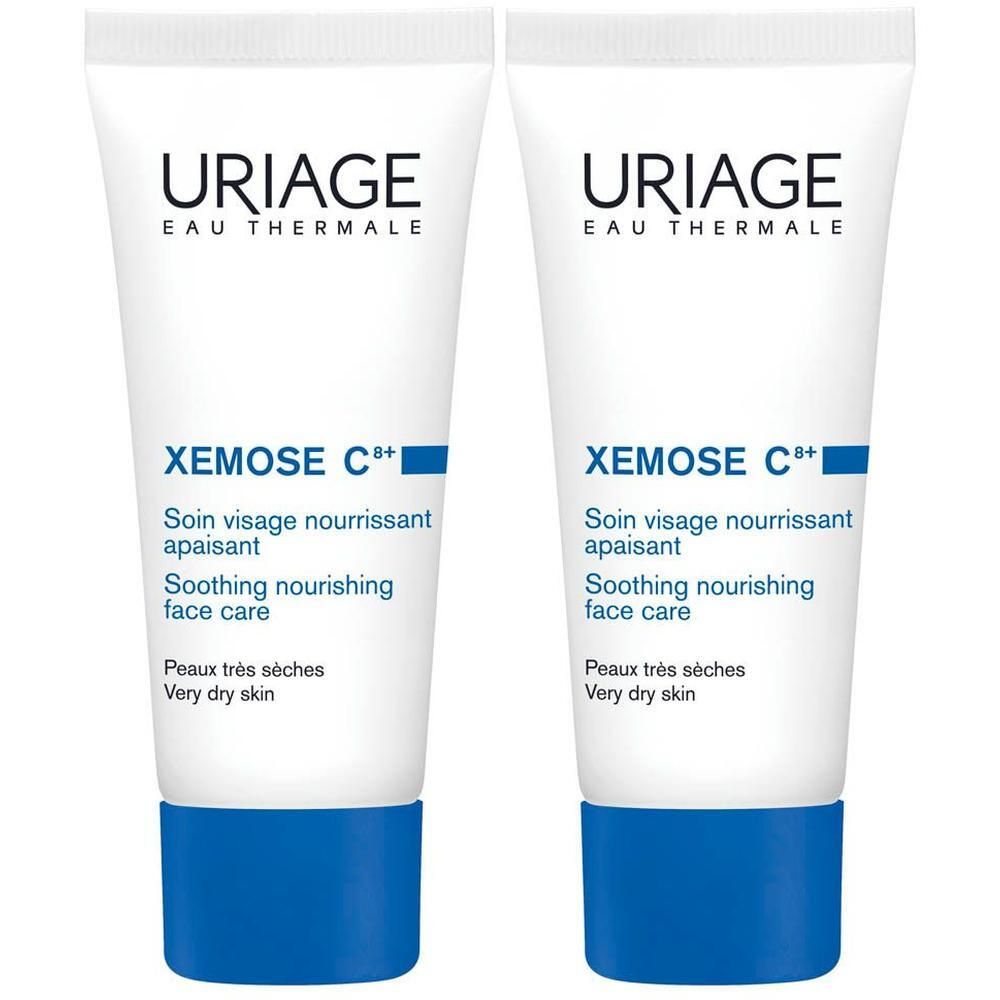 Deux tubes de crème Uriage Xémose C+. Tubes blancs avec bouchon bleu.