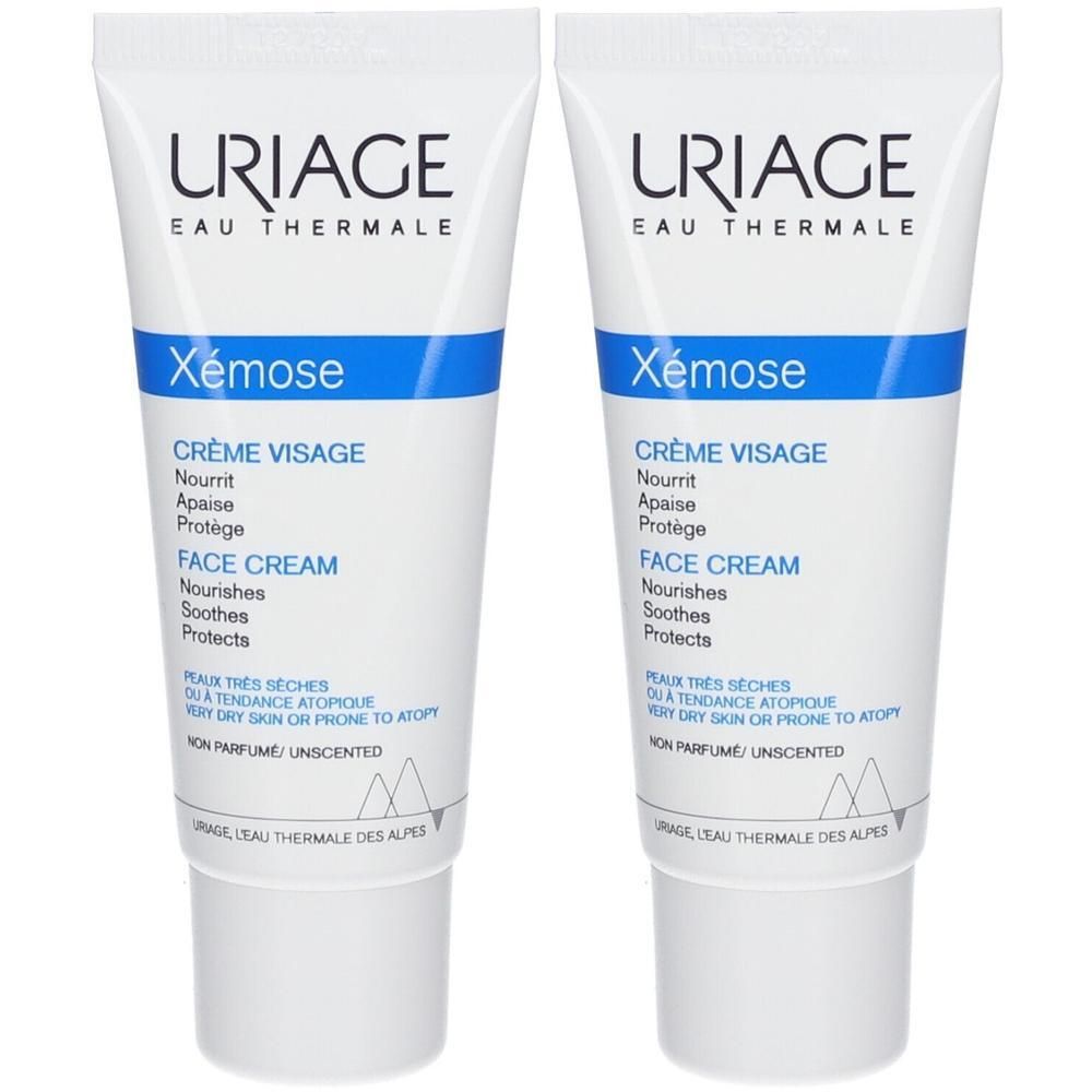 Deux tubes de crème visage Uriage Xémose. Tubes blancs, texte bleu et bouchon.