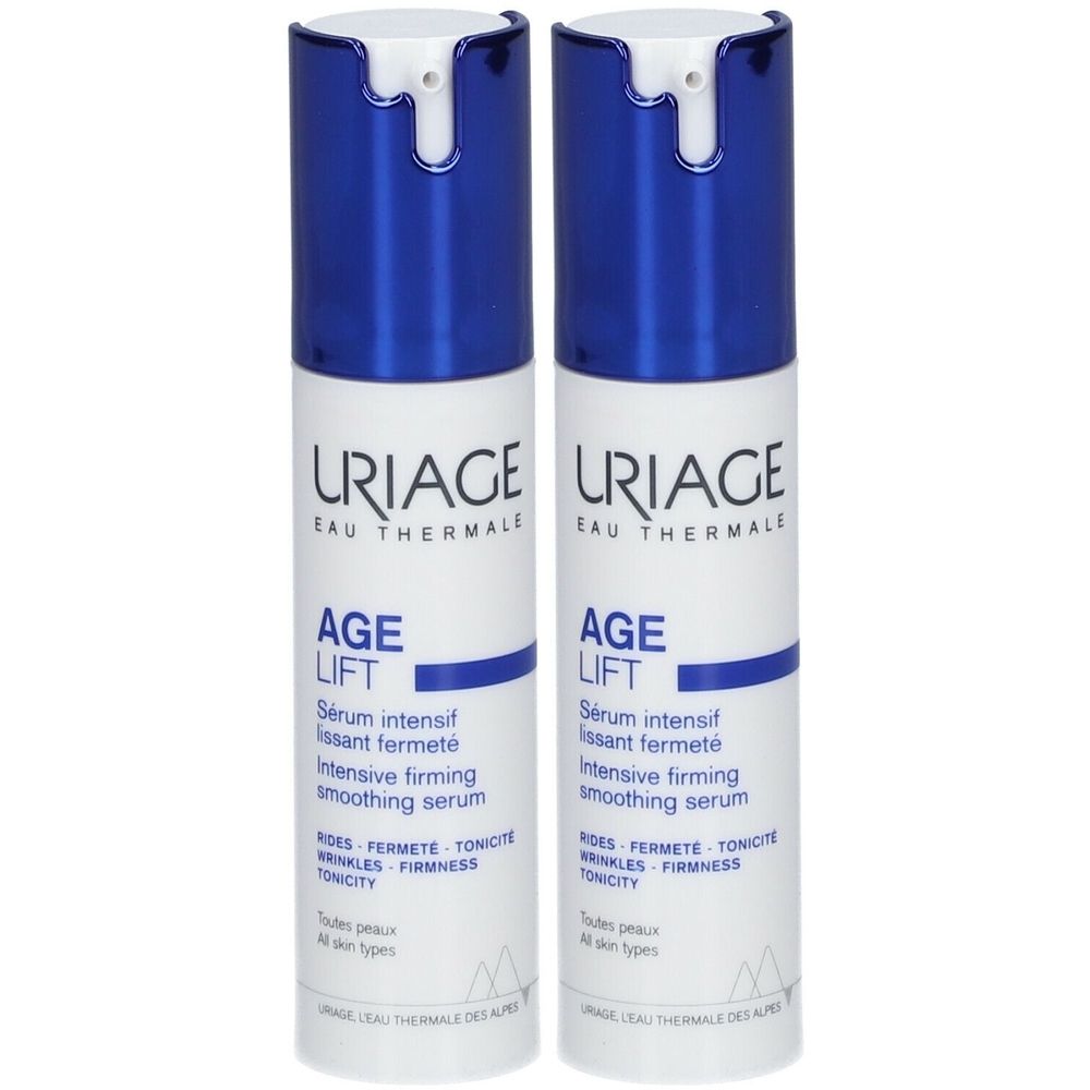 Twee Uriage Age Lift serumflessen. Wit-blauwe flessen met doseerkop. Tekst: Age Lift, Serum intensif lissant.