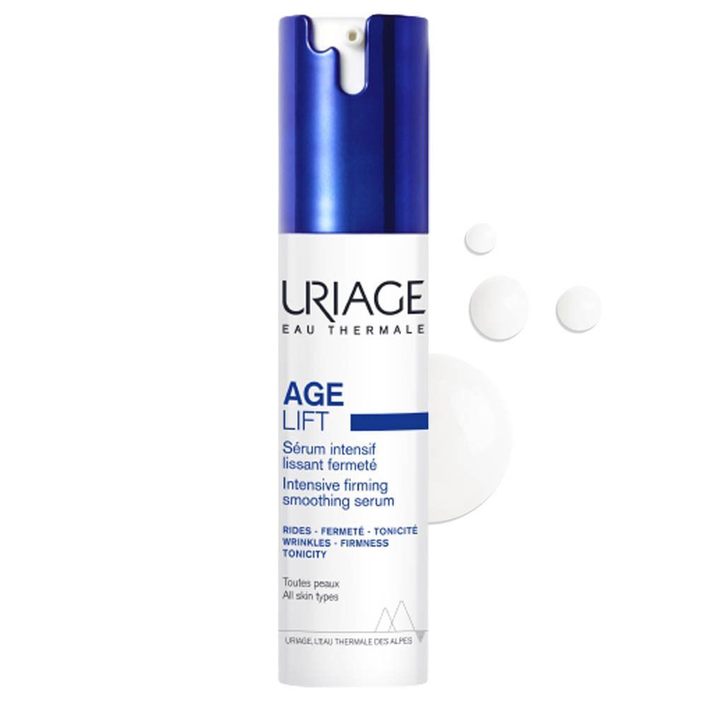 Een Uriage Age Lift serumfles. Wit-blauwe fles met doseerkop. Tekst: Age Lift, Serum intensif lissant. Druppels.