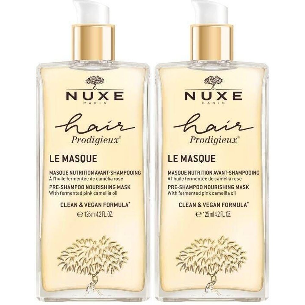 Twee flessen Nuxe Hair Prodigieux Le Masque. Gouden doppen, transparante flessen. Zwarte tekst.