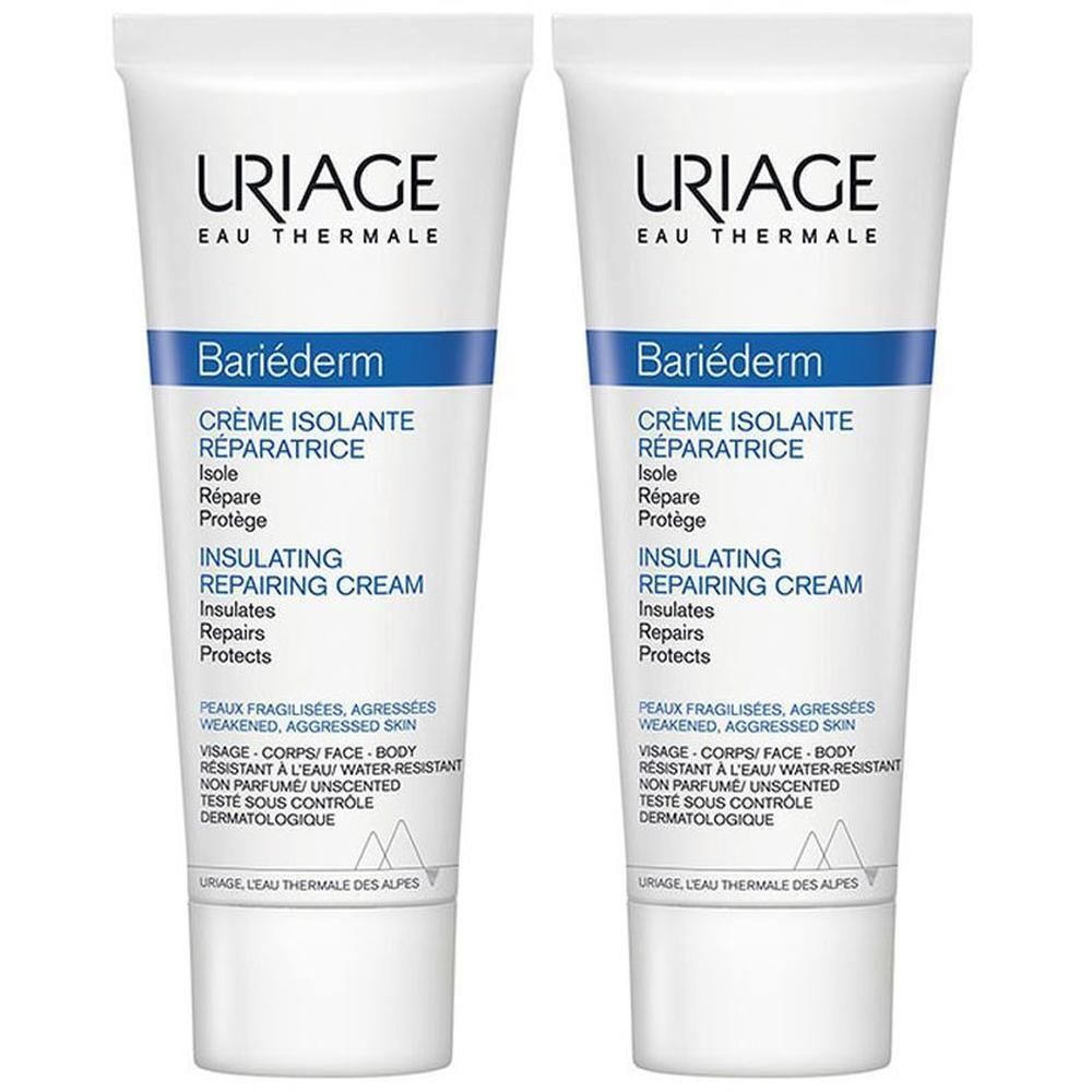 Twee tubes Uriage Bariéderm Repair Cream. Witte tubes met blauwe tekst. Tekst: Crème Isolante Réparatrice.