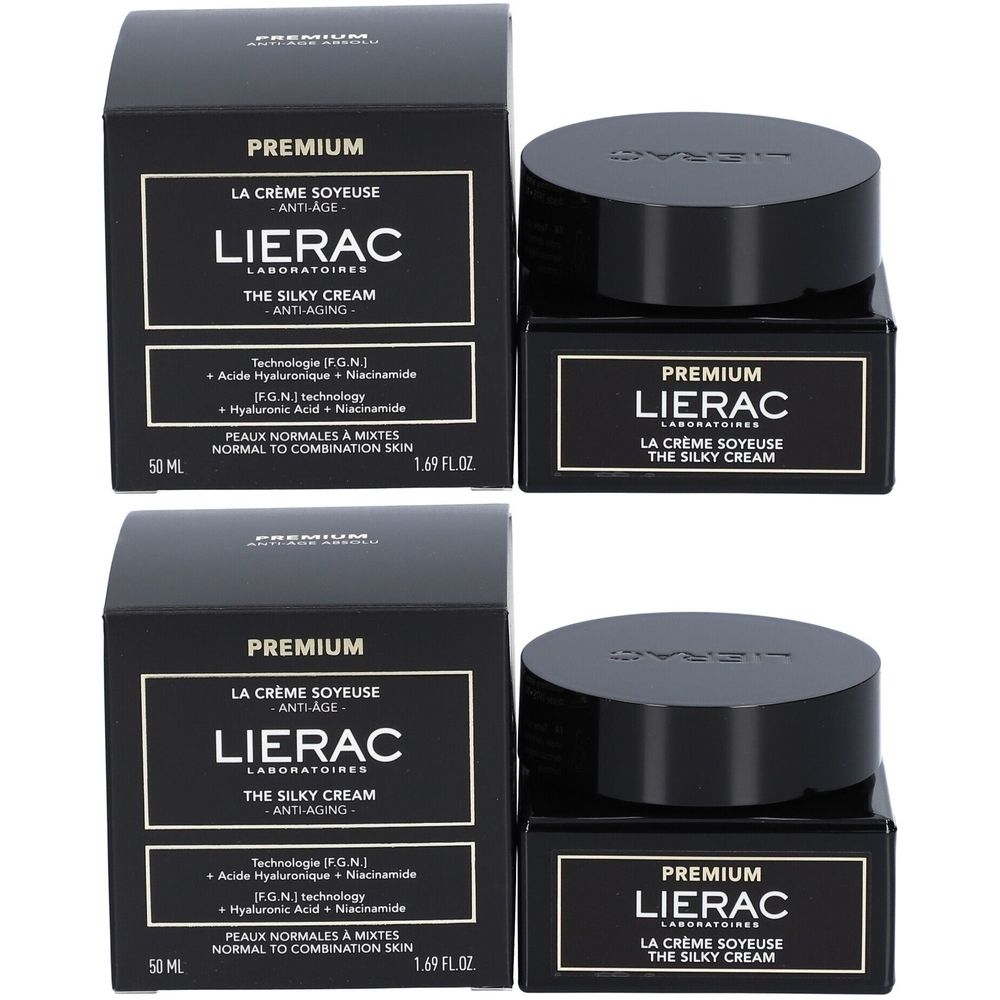 Twee zwarte potjes en twee dozen. Op de potjes en dozen staat "PREMIUM LIERAC LA CRÈME SOYEUSE THE SILKY CREAM".