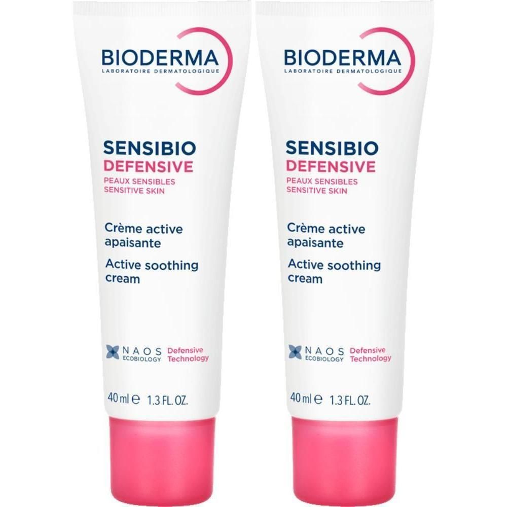 Twee tubes Bioderma Sensibio Defensive crème. Wit, roze accenten. Tekst: Sensibio Defensive, Active soothing cream.