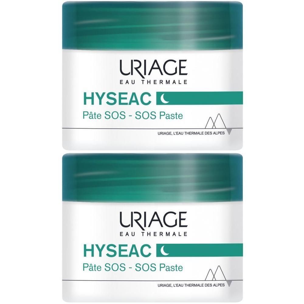 Deux pots de Uriage Hyséac SOS-Paste. Récipients blancs avec couvercles verts. Inscription Hyséac et Uriage.