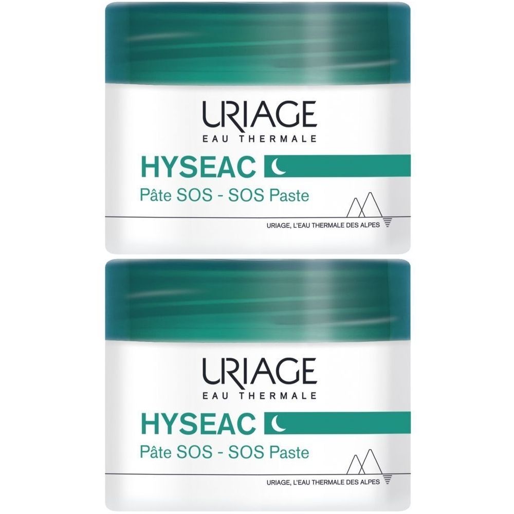 Twee potjes Uriage Hyséac SOS-Paste. Witte potjes met groene deksels. Opschrift Hyséac en Uriage.