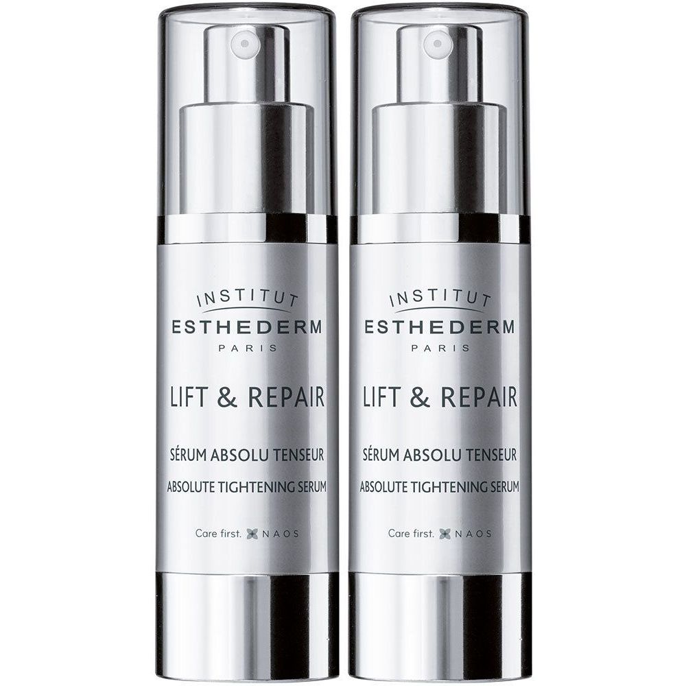 Twee flacons Institut Esthederm Lift & Repair serum. Zilverkleurige pompflesjes met witte opdruk. Tekst: Lift & Repair, Absolute Tightening Serum.